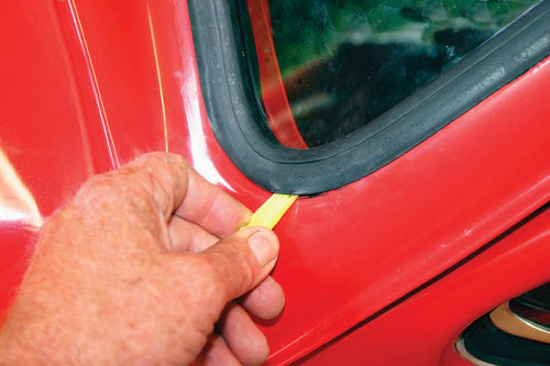 Use a plastic filler spreader or a tongue depressor to help the lip of the seal out over the cowl.