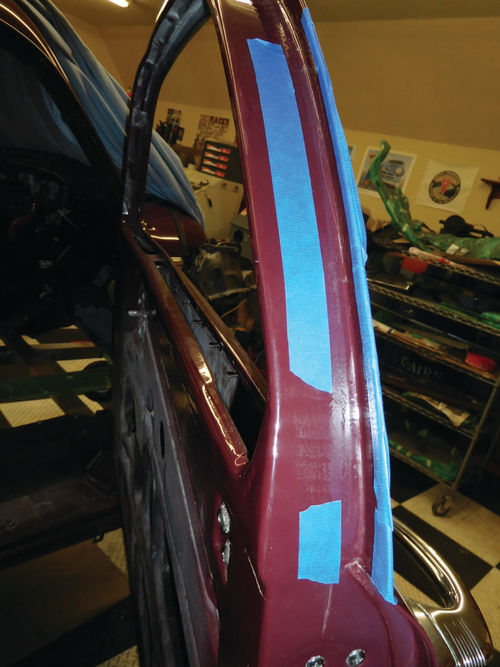 The black 3M Super Weather Strip Adhesive (also recommended by Joe Gilles) will be applied to the door between the blue tape strips and also on the back of the rubber seal.