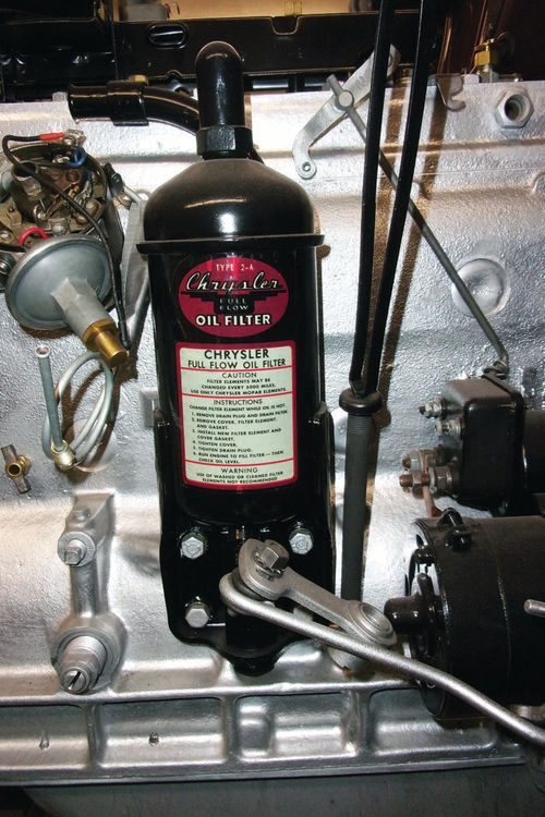 Canister oil filters like this 1948 Chrysler unit can leak, as can the oil delivery lines that route the oil through the filter. Good seals and tight tube fittings can fight oil leaks.