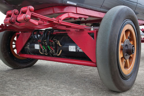 Lead-acid batteries provide the voltage to turn the rear wheels.