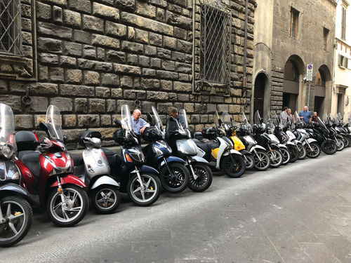 A row of scooters shows just how little room there is on the street to park – this is why many Italians drive micro cars.