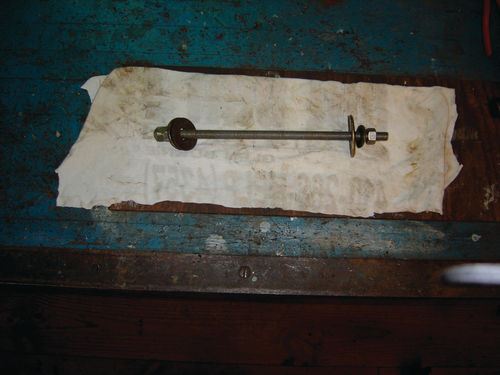 A homemade puller was employed to remove the outer bearings.