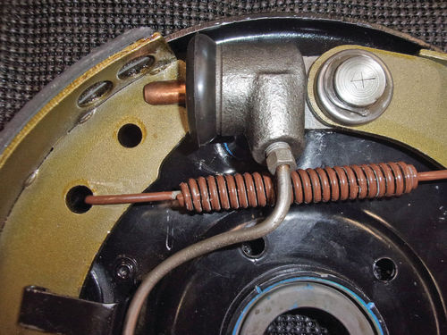 The Link used with the wheel cylinder that was different is brass-colored and shorter.