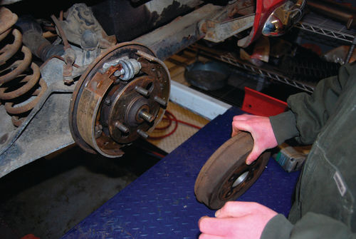 Brake drum removed from a Triumph hub that has the studs in it. Note stud holes in drum.