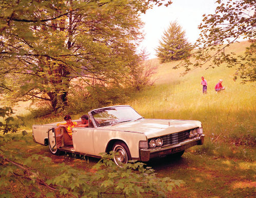 Who needs an SUV when you can drive your Continental into a field.