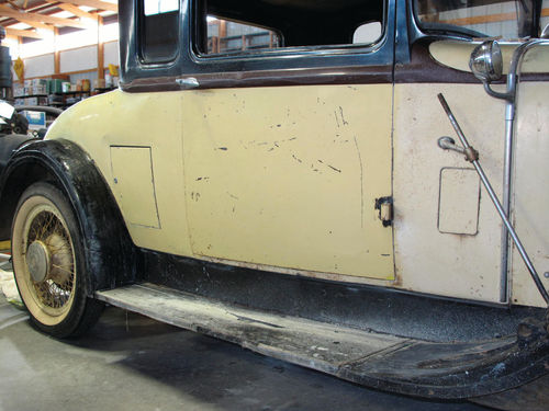 The glowing pale-yellow paint on the sanded door and quarter panel was once as chalky, nearly white, as the un-sanded cowl.