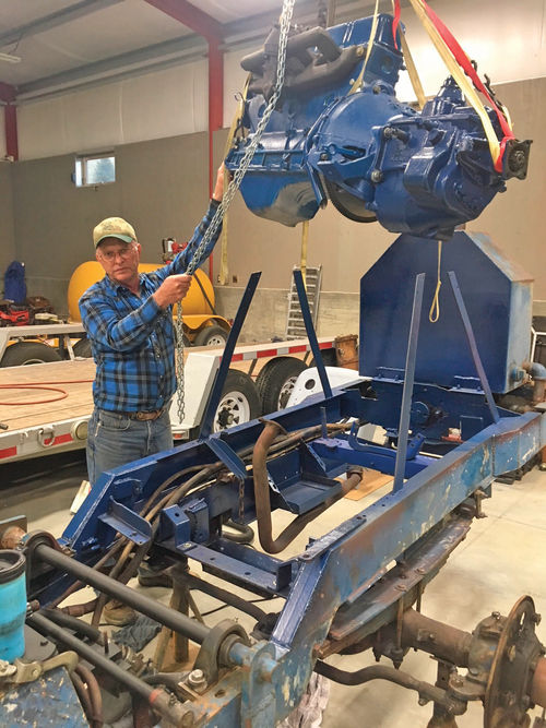 Here’s brother Chris helping with the engine installation.