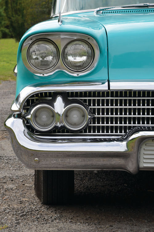 Dual headlights that were new in 1958 are mirrored in the parking light unit in the grille.