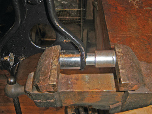 A vise was used to press the new control arm bushings in.