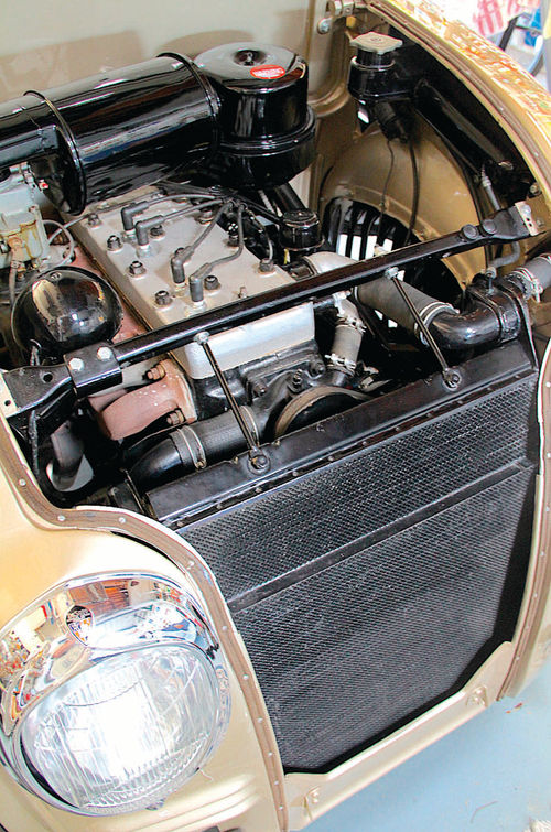 The sturdy flathead six was smooth and long-lived. Note that the radiator tank is on the driver’s side fender panel to lower the hood profile.