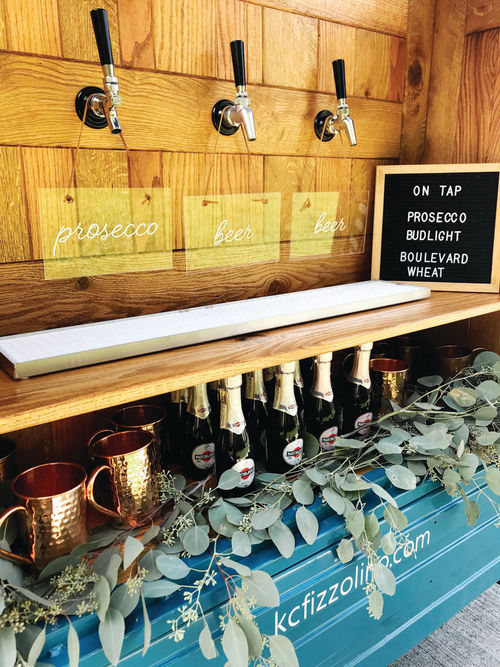 Details of the oak interior; each tap has a customized sign. Options for beverages are endless with Fizzolino!