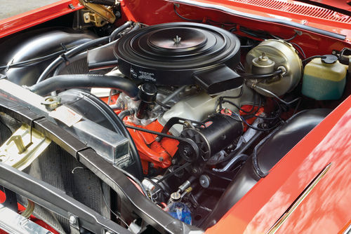 The 409 grew out of the 348 and has no connection to Chevy’s small-block V-8s. It is an impressive sight.