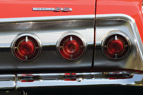 Round taillights were for a number of years a signature Chevrolet feature. Three per side mark the car as an Impala.