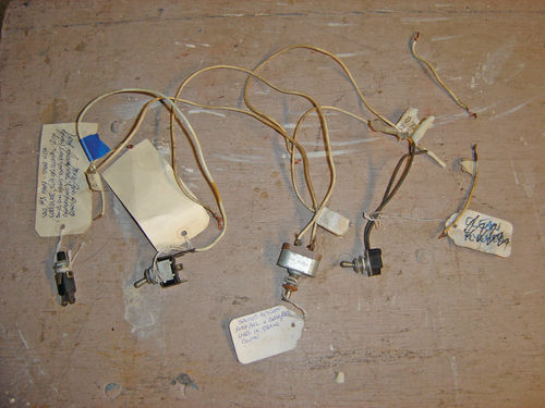 A variety of jury-rigged switches had been spliced into the wiring.