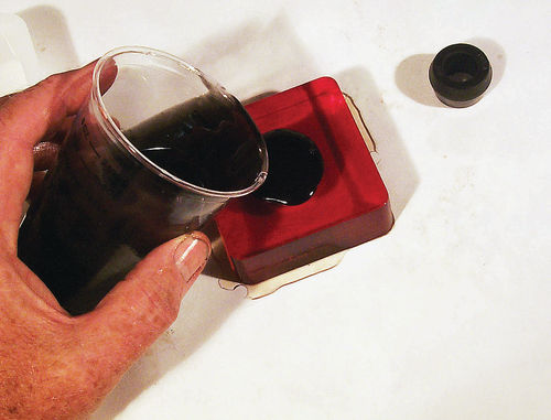 Pour in rubber compound slowly to prevent bubbles and slightly overfill to allow for shrinkage.