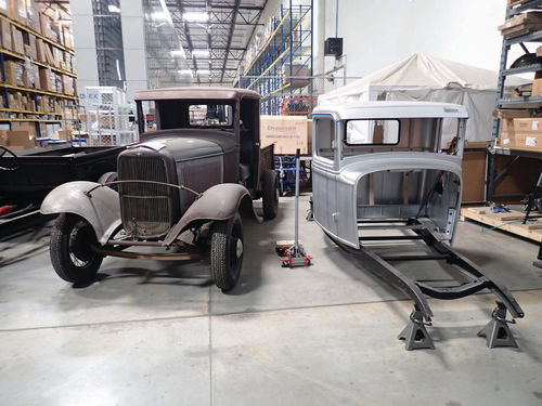 The main lobby is home to two beautiful classics: a Bronco and a Ford Coupe (mid-page). At the bottom of the page are two projects in process.