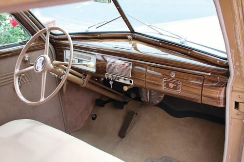 The three-on-the-tree shifter was an uncommon sight when this car first left the showroom.