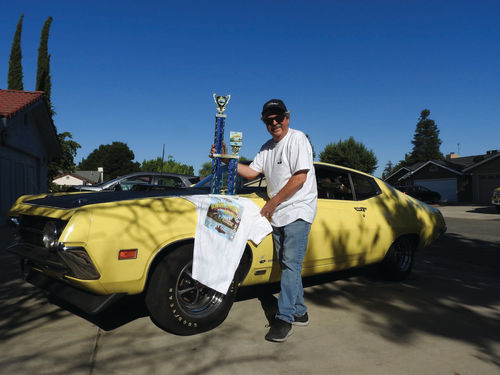 The Torino, its owner and their first trophy.