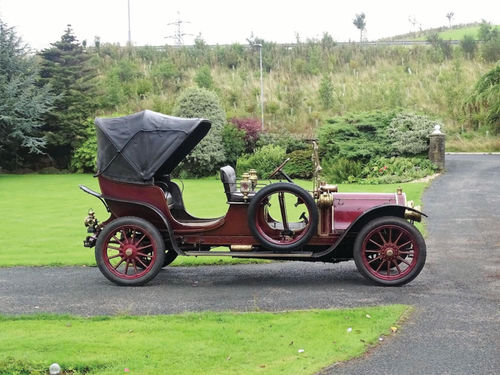 Here’s one way to turn heads when you’re out for a drive. With the top up, the horseless carriage heritage of the times comes through.