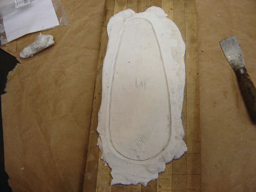 When Versimold didn’t work, a clay mold was created to test various gasket materials.