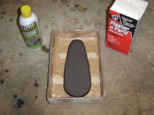 The clay mold was too rough, so a plaster version was poured over a gasket mock-up.