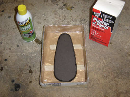 The clay mold was too rough, so a plaster version was poured over a gasket mock-up.