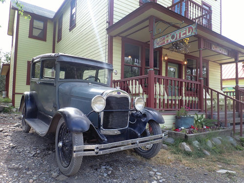 A historic car for a historic hotel, this Model A sits parked next to Ma Johnson’s Hotel.