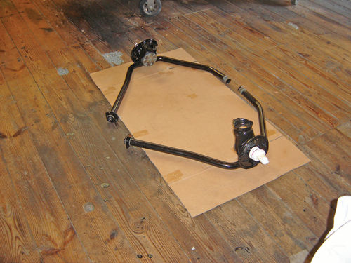 The rear swing arms awaiting installation.