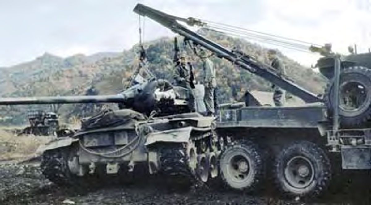 1945 Ward LaFrance Wrecker hauling a tank