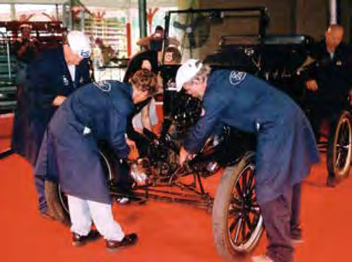 Installing the carburetor, timer and steering wheel on a Ford Model T