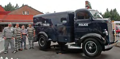 Photo 11. “Prisoners” were on hand to tell show visitors about the truck restoration project.