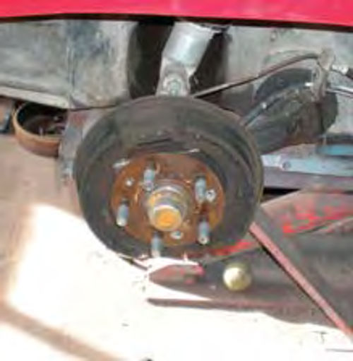 Photo 2. Rear brakes with worn-out shoes which are no longer available.