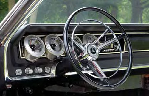 The size of the steering wheel and the brightwork on the dash suggest the Charger’s era. The look is dated, but the materials have held up well.