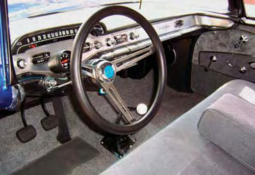 The interior is a combination of original equipment and modern updates.