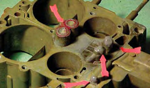 Photo 7. A close look at repair areas on a Quadrajet carburetor.