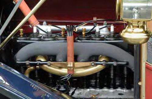 It’s a simple design, but the E-M-F’s flathead engine with its brass and its exposed valve gear looks very different from a modern four-cylinder.