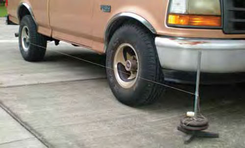 Photo 17. String is used to help correct an off-center steering wheel.