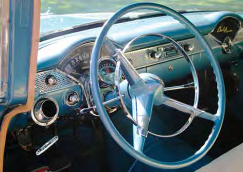 The dash is factory stock, right down to the air conditioning nozzles. Even the Moon Eyes tachometer is a period piece and it’s used for more precise tuning and fuel economy.