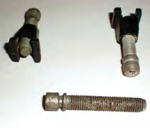 Some special adjustment screws and plastic “self-retaining” nuts typically used in aiming headlights.