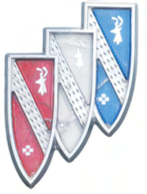 Buick’s tri-shield emblem reportedly can be traced to the ancestral Scottish coat of arms of the car maker’s founder, David Buick.