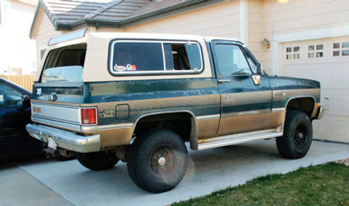 This 1988 GMC Jimmy was sound, but as you can see, the clear coat was peeling everywhere.