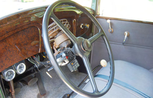 The owner has installed full gauges in the Willys-Knight using under-dash units mounted to the left of the steering wheel.