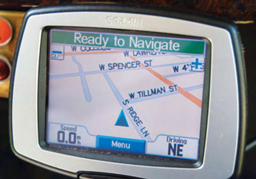 To navigate, it shows a street map (right). A feature owners like is the left-hand speed readout as speedometers in old cars often are inaccurate. The bottom right corner provides a compass function.