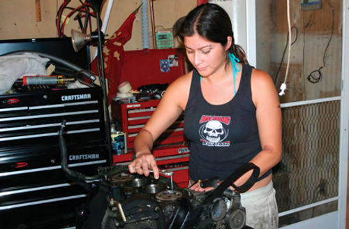 Cleaning the head bolt threads after replacing a head gasket on her ’91 MR2.