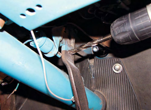 Photo 9. The booster pushrod is attached at the power brake position on the pedal arm. This pedal arm did not have the second hole, so a new one was drilled.