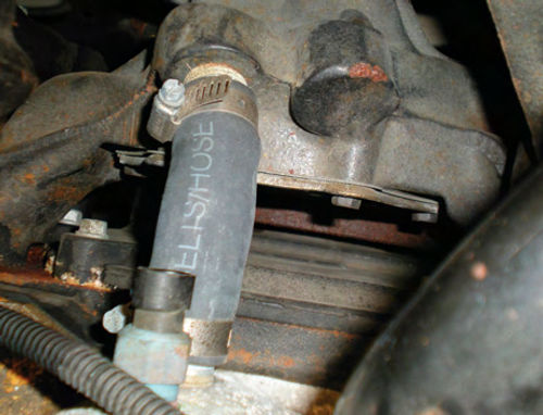 Photo 7. The by-pass hose, connecting the water pump to the intake manifold, is a weak spot.