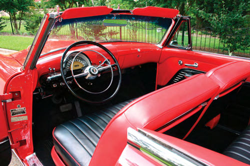 Among the 30 trim choices offered for 1953 were eight vinyl picks, including this red-and-black combination.