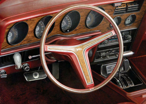 The thin steering wheel with the horn ring built into the rim itself is a love-it-or-hate-it design.