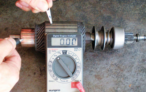 Photo 13. Using a 12-volt battery and voltmeter to check for an unwanted ground, the reading should be zero.