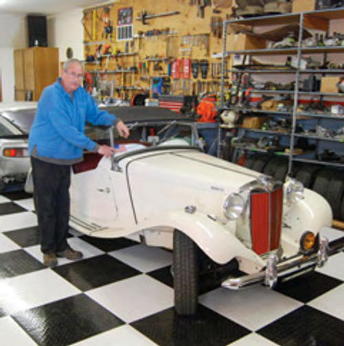 Restorer Shane Hanke has his sports car shop located in the building